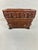 Brown ceramic footed planter/cachepot with embossed floral design and lion feet distributed by Hosley Company. This is a...