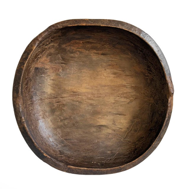 Vintage large solid wood bowl. Hand carved by the Baga people of Guinea from a solid piece of indigenous wood. This piece...