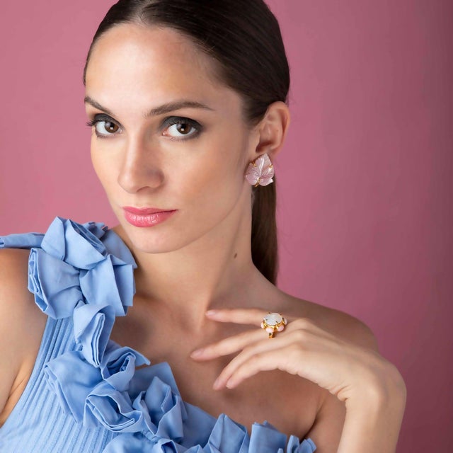 Elevate your style with the Harriet Ring, a masterpiece crafted from semi-precious stones. Its captivating floral design...