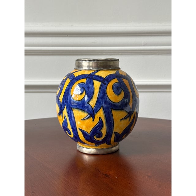 This signed hand crafted vase is wonderful for anyone who appreciates one of a kind pieces. This vintage vase was...