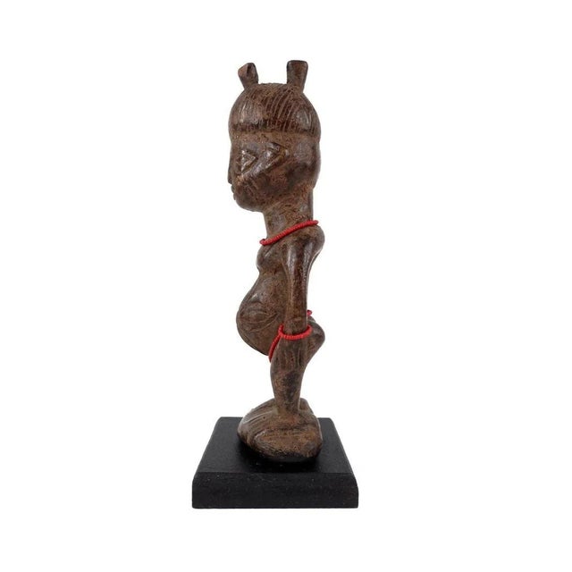 Ibeji figures, carved by the Yoruba people of Nigeria, are wooden twin sculptures holding cultural significance in Yoruba...
