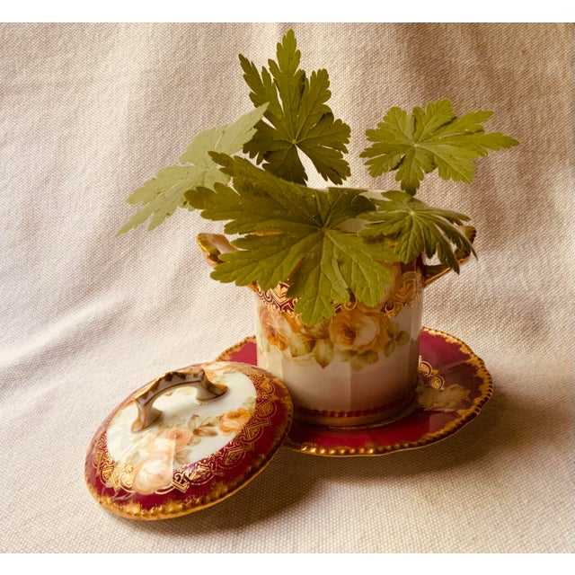 A magnificent and beautifully preserved Gilded Age antique French fine porcelain covered condensed milk can holder with...