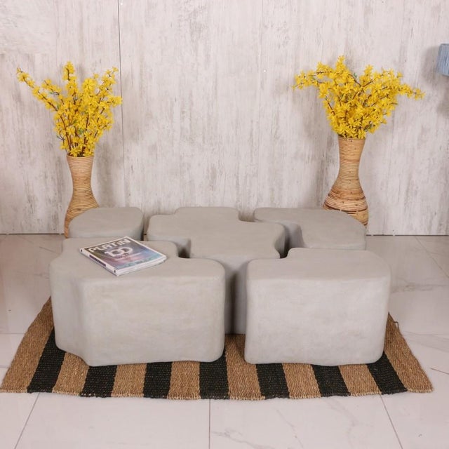 Our Sawa Concrete Coffee Table Set consists of 5 separate pieces, each designed to complement modern living spaces with a...