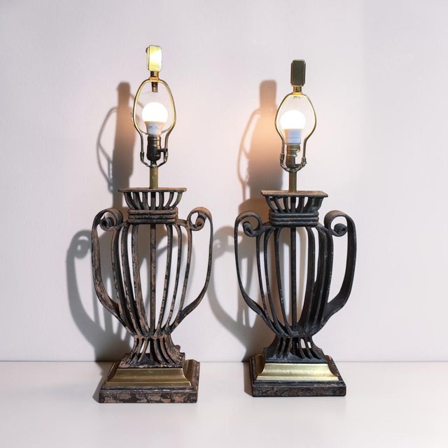 A spectacular and exceptionally substantial pair of vintage table lamps by Chapman, dating to 1991–1992. Designed in a...