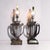 A spectacular and exceptionally substantial pair of vintage table lamps by Chapman, dating to 1991–1992. Designed in a...
