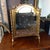Elegant gilt metal mirror suitable for table top of on the floor to admire your new shoes. Very solid and well made....