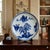 This is a stunning, oversized Japanese Arita-style porcelain charger featuring a classic Sansui (mountain and water)...