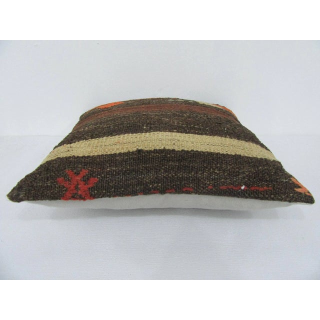 Handmade decorative pillow cover made from a vintage Turkish kilim rug. Backed with good quality cotton fabric. Pillow...