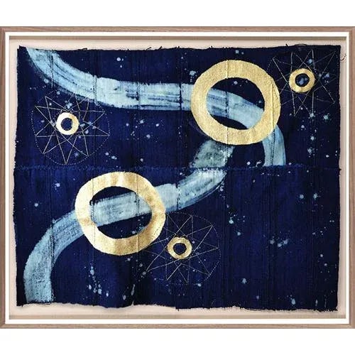 Orbital by Catherine Lisle reflects the movement of celestial bodies in gold leaf and intricate star-shapes hand-stitched...