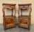A fine pair of French bedside end tables or nightstands - each Stand featuring a scalloped edge gallery over a frieze of...