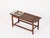 Wonderful and rare Mid-Century small bench in solid teak with elegant brass details. This stylish bench is attributed to...