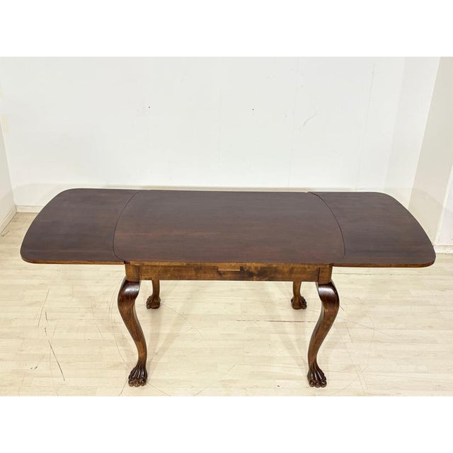 For sale is a very beautiful, extendable Art Nouveau dining table, distinguished by its impressive eagle legs. The...