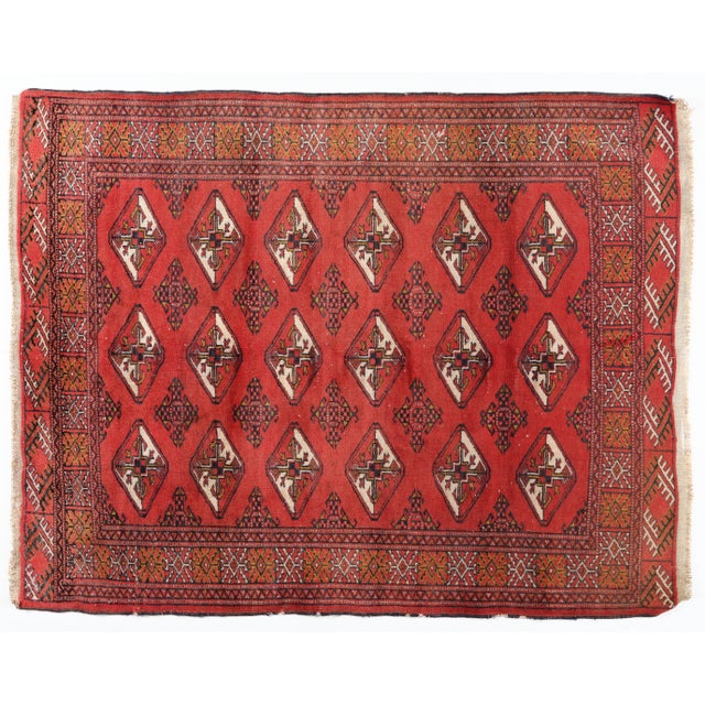 This Beautiful Turcoman vintage rug embodies the rich weaving traditions of Central Asia. Handwoven with meticulous...