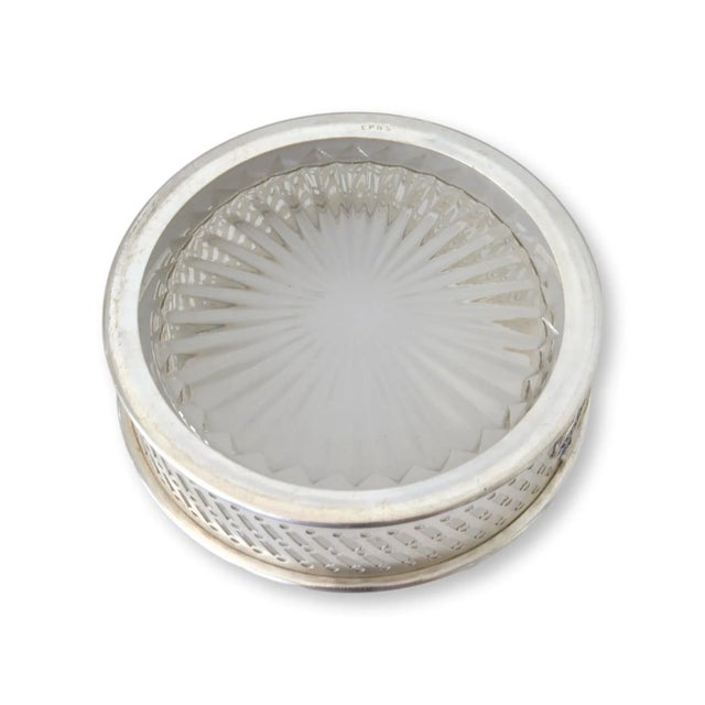 Antique and rare, this P&O S.S. Ballarat silver-plate wine coaster features a unique removable glass bottom and an...