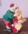 Great Holiday Christmas Statue Santa and Mrs. Claus ~ Santa Steals A Kiss & A Cookie, 1990s. Made from resins and molded...