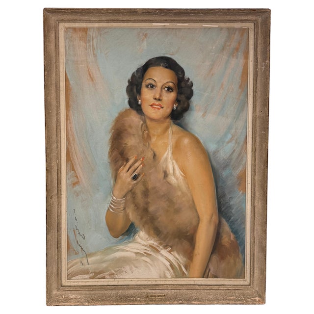 A wonderful pastel on paper of a society lady signed and dated 1938. The work is beautifully framed in a period frame and...
