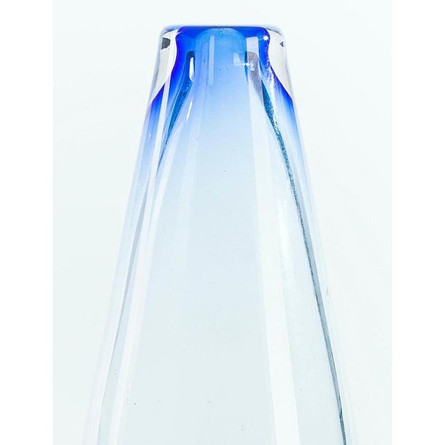 This blue blended glass Vase is a small unifleur vase, in the transparent, coated glass, with shades sloping to blue...