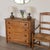 Beautiful French Provincial carved oak four drawer dresser, 1940s. Lovely carved wooden drawer pulls. Original wood finish...