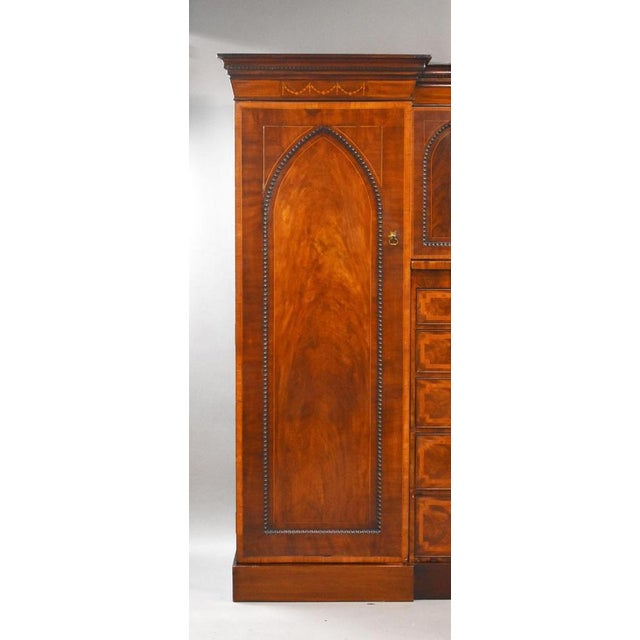 Victorian Flame Mahogany Breakfront Triple Wardrobe with Drawers : An impressive Victorian flame mahogany breakfront...