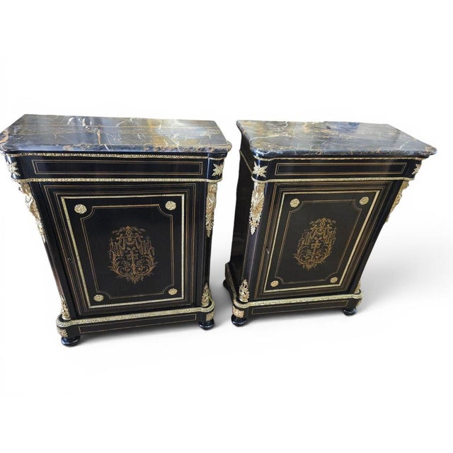 Elegant pair of French cabinets dating from the 19th century, showcasing the refined craftsmanship and luxurious materials...