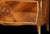 A striking French Art Deco buffet in the style of Gaston Poisson designs. This exceptional sideboard showcases the refined...