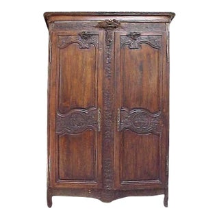 18th Century French Country Highly Carved Walnut Wedding Armoire For Sale