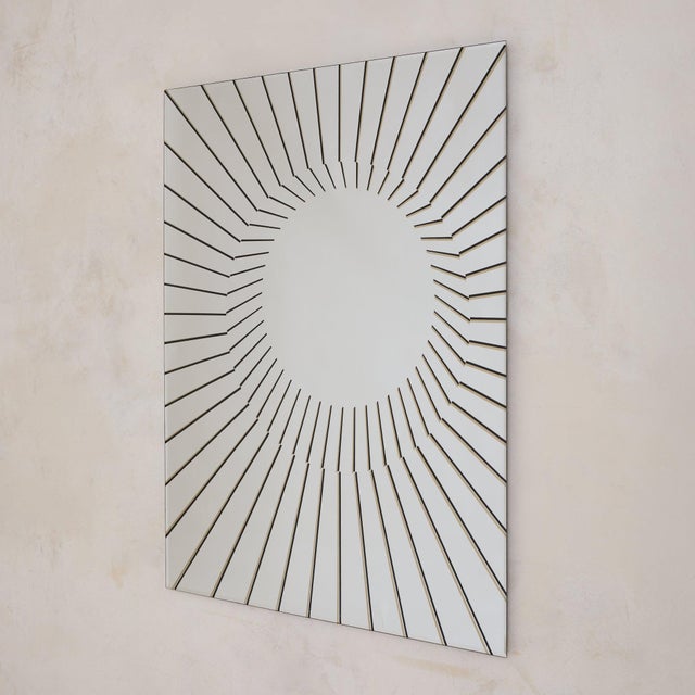 A vintage wall mirror by Rimadesio, the Italian firm long admired for its precision in glass and architectural surfaces....