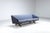 A refined Illum Wikkelsø model ML-90 three-seater sofa, produced by Mikael Laursen, Denmark, circa 1960. This sculptural...