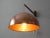 Infinitely swiveling wall lamp with a copper shade and a teak and brass swivel arm suspension in a minimalist Scandinavian...