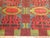 A dazzling European modernist carpet with intense colors and an abstract design. 7' x 9'10''
