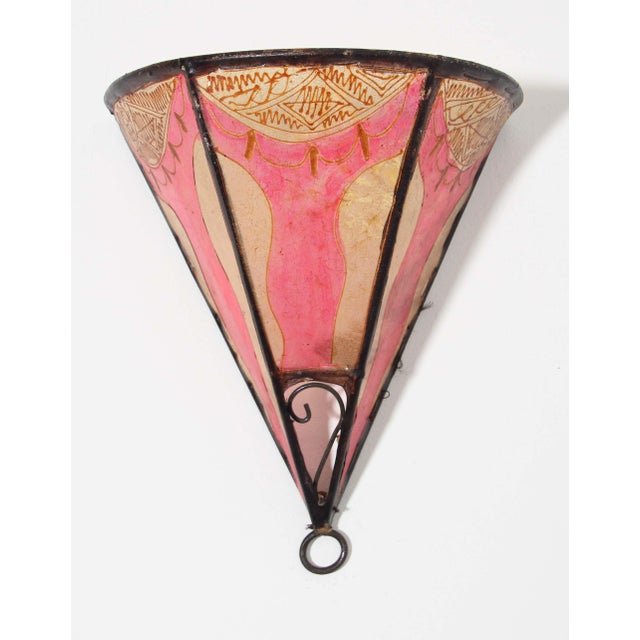 African tribal art parchment wall shade sconce featuring a large triangle hide form stitched on iron and hand painted...
