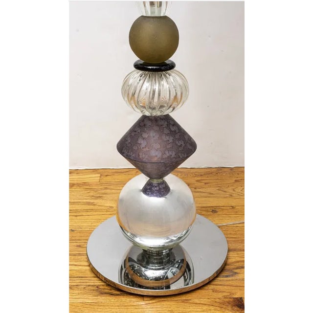 Beautiful Venetian glass table lamp featuring rich amethyst glass highlights, sparkling crystal accents, and a warm copper...