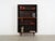 The bookcase was made in the 1970s, Danish production. The structure is covered with rosewood veneer. The legs are made of...