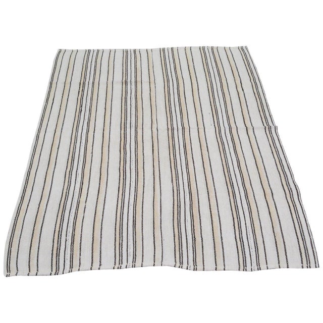 Flatweaved with care using traditional rug-making techniques, this hemp rug blends timeless craftsmanship with a modern...