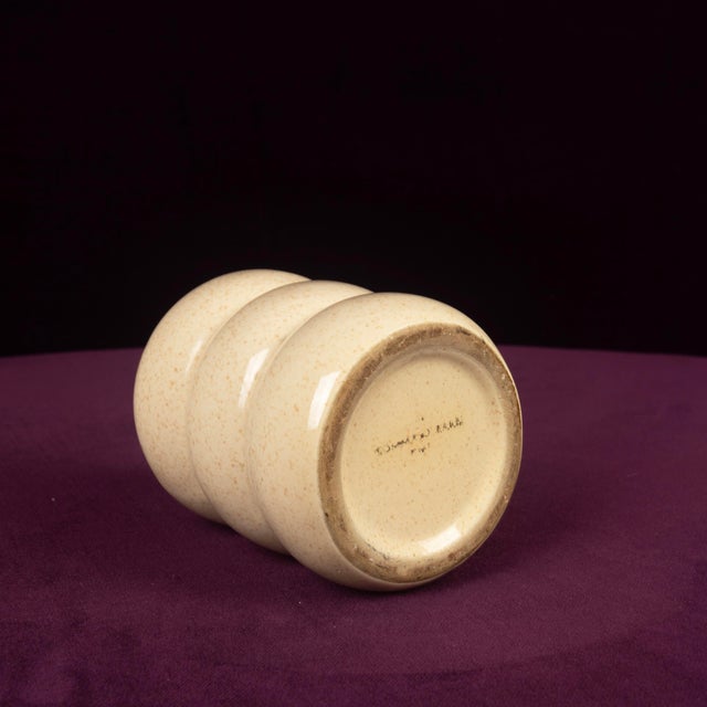 Overview elegant table lighter designed by tommaso barbi, made in italy in the 1970s. A softly sculptural desk object...