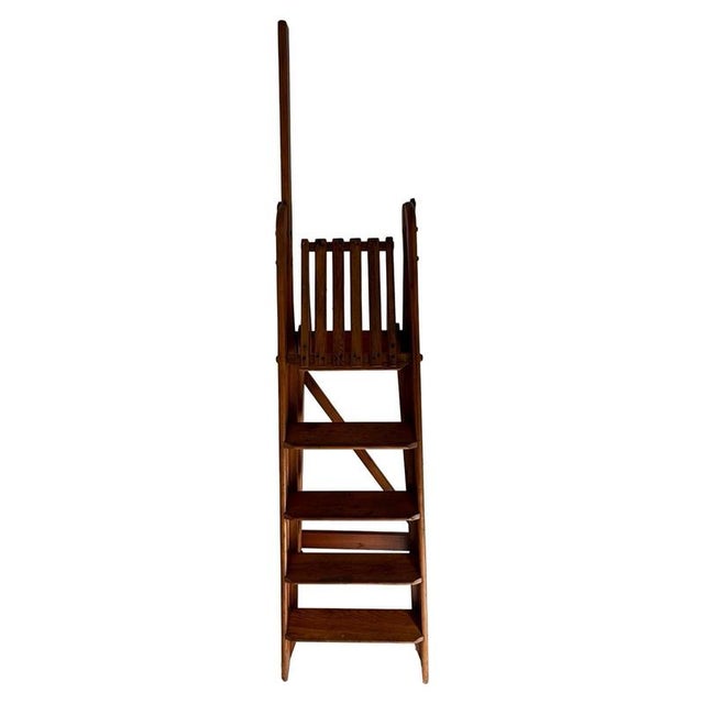 Antique (ca.1900’s), library stairs or ladder. Foldable so easy to store. Made in the Netherlands and sold by Fa....