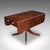This is a large antique Pembroke table. An English, mahogany drop leaf dining table for four, dating to the Regency...