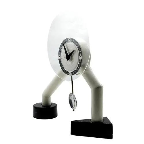 This ceramic table clock is a combination of black and white round and triangular geometric shapes in 1980s. Working...