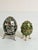A refined pair of vintage decorative eggs, each with its own unique artistry and display presence. This two‑piece...