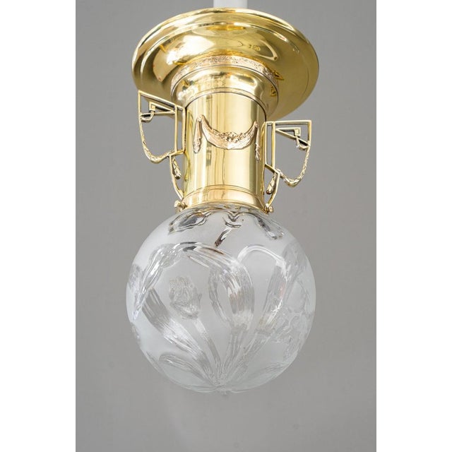 Jugendstil ceiling lamp vienna around 1908 Brass polished and stove enameled Original antique floral glass shade Up to...