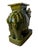 This is a mid-century glazed ceramic elephant garden stool or plant stand in a rich olive green glaze. The elephant is...