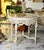 Make a grand statement in your dining room with this breathtaking Grand Round Dining Table, masterfully crafted from...