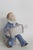 This charming Figurine is made of porcelain. This adorable piece is stamped as being made by Royal Copenhagen in Denmark,...