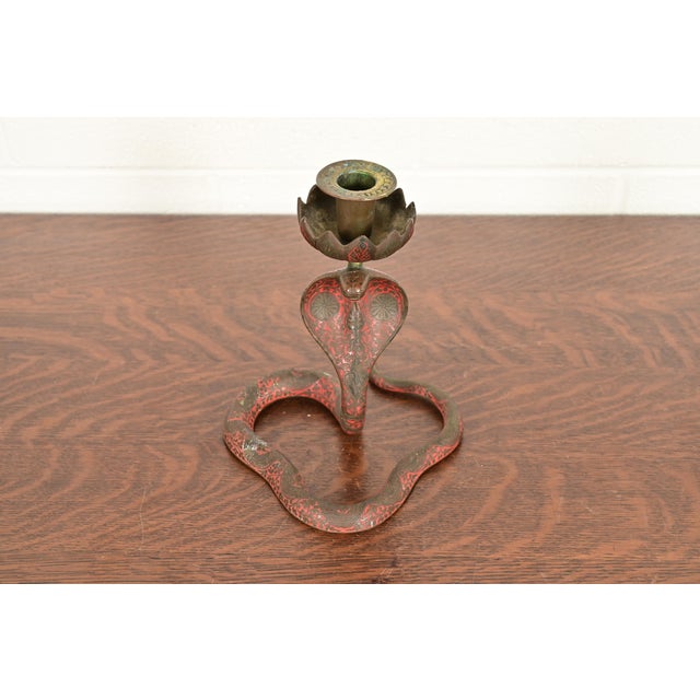 A gorgeous antique Arts & Crafts or Art Deco period bronze and enameled cobra form candlestick Circa Early 20th Century...