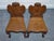 A striking pair of Victorian solid oak carved hallway chairs, beautifully hand-crafted in the late 19th century. These...