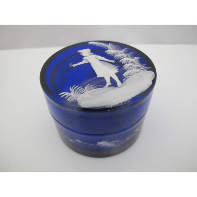 Mary Gregory antique bohemian cobalt blue glass trinket box with white enameled decoration of a young girl holding a...