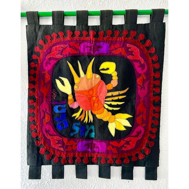 This depicts a Crab, In Hebrew Mazel Sartan (the Zodiac symbol Cancer, June-July) all made by hand. woven and stitched....