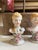 Charming vintage porcelain salt and pepper shakers depicting an elegantly dressed Victorian-style couple. This petite...