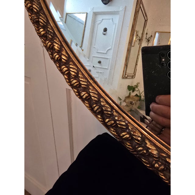 A true vintage original mid century modern Hollywood Glamour Regency gilded mirror ( guaranteed a vintage from the 1960's...