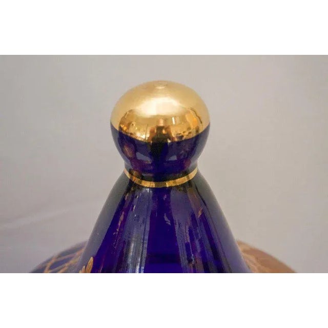 This stylish set of cobalt blue and gilt gold covered jars were acquired in Rome, Italy in the 1960s. They could be used...